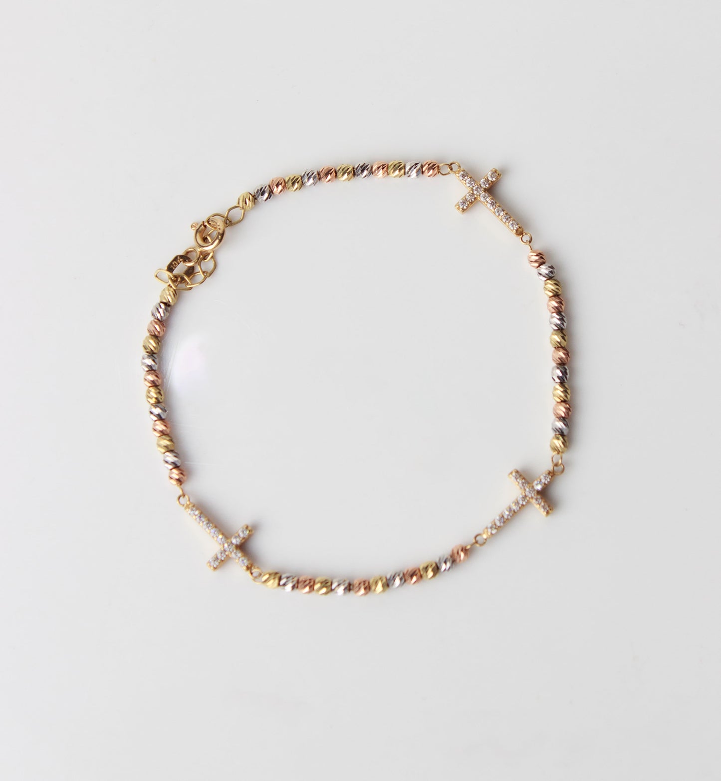 Pulsera de cruces